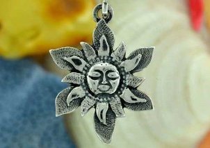 The sun symbol is a small lucky amulet