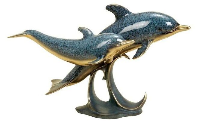 love amulet shaped dolphins
