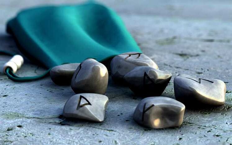 pouch with runes as an amulet for luck